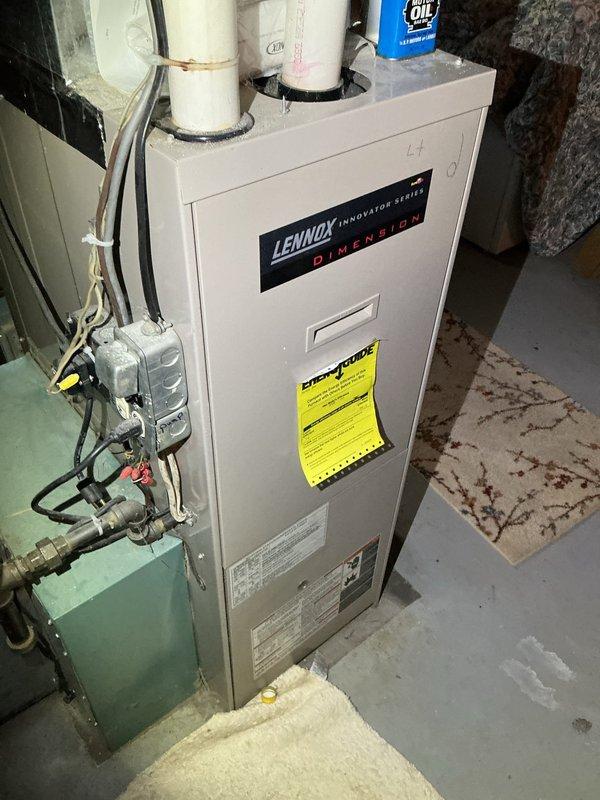 Responded to no heat call on 25-year-old Lennox Dimension furnace. Upon inspection, discovered failed electrical supply to unit due to faulty switch and identified cracked heat exchanger near mounting bolt. Documented conditions with photos and advised customer that system requires replacement due to compromised heat exchanger and age of equipment. Recommended electrician for electrical repairs and comfort advisor consultation for new system installation.