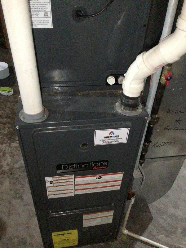 Responded to service call for reported campfire smokey smell from furnace upon initial startup of heating season. Performed thorough inspection of Distinctions brand furnace unit including visual examination of all accessible components and combustion chamber. Utilized inspection camera to conduct detailed internal examination of heat exchanger for cracks, deterioration, or carbon buildup that could produce odor. Monitored complete furnace operation cycle while observing burner ignition, flame characteristics, and airflow patterns. No defects, damage, or safety concerns identified with heat exchanger or combustion system. Determined odor likely attributed to normal dust burn-off from extended period of inactivity during summer months, which is common during first heating cycle of the season. Unit operating within normal parameters with proper ignition sequence and no abnormal conditions detected.