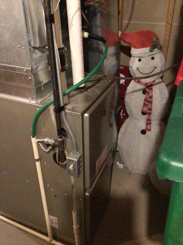 Completed annual furnace tune-up and maintenance inspection with no issues found. Cleaned flame sensor, performed electrical testing with all readings within manufacturer specifications, replaced air filter, verified all drain hoses were clear and draining properly, and confirmed heat exchanger condition was satisfactory.