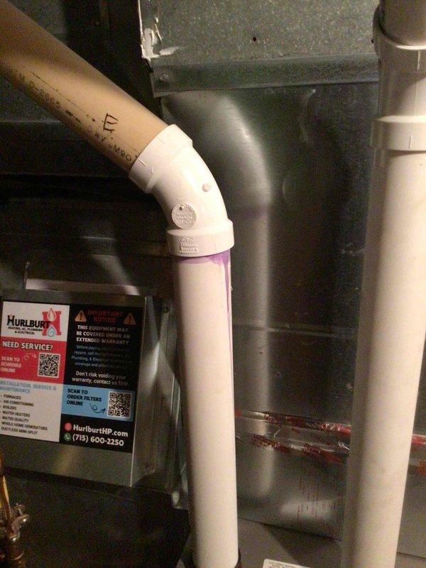 Responded to service call for newly installed furnace with leaking exhaust pipe. Upon inspection, discovered PVC exhaust pipe connection was not properly glued during initial installation. Applied PVC primer and cement to secure the joint, resolving the leak and ensuring proper venting operation.