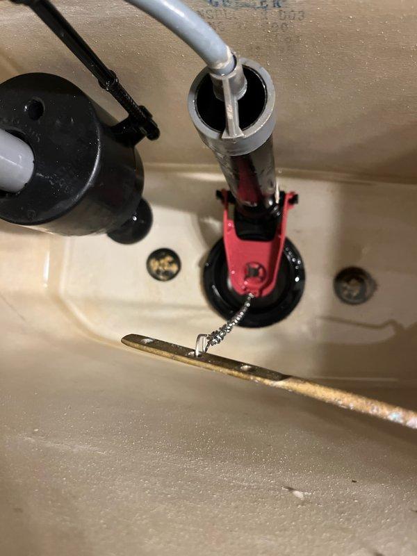 Responded to a continuously running Gerber toilet where the homeowner had attempted an adjustment that resulted in a component detaching. Upon inspection, identified a deteriorated flapper that had disintegrated within the tank. Completed full replacement of the failed flapper assembly and verified proper flush valve operation to restore normal function.