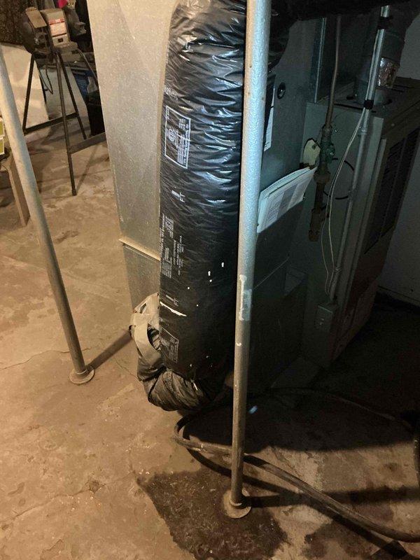 Performed TISH safety inspection on a 31-year-old Goodman furnace for municipal compliance. Verified ignition system, flame safety controls, gas valve operation, venting system, combustion air supply, control board functionality, and electrical amp draws—all operating within acceptable parameters. Visual inspection of heat exchanger revealed no visible cracks or holes; however, observed flame rollout when blower motor engaged, indicating a potential hidden breach in the heat exchanger that could not be directly accessed or confirmed during inspection. System was left operational, discussed replacement options and safety concerns with homeowner, and scheduled follow-up consultation with service advisor to review equipment replacement recommendations.