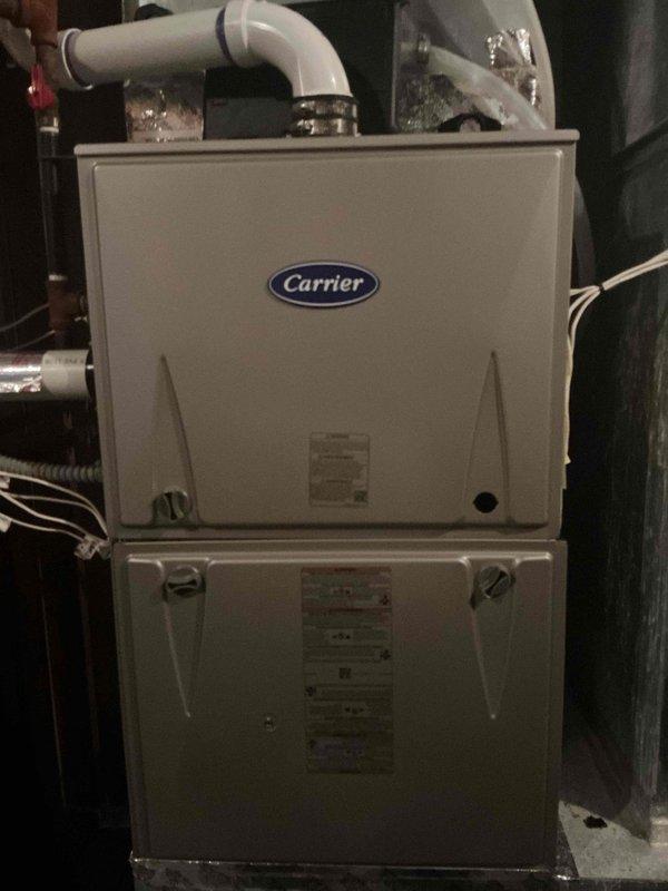 Completed annual preventative maintenance heating visit on Carrier furnace system, including one gas heater, one humidifier, and two gas fireplace units. Performed comprehensive tune-up and inspection of all equipment, with all systems operating within normal parameters. Replaced furnace filter and humidifier filter as part of routine maintenance service.