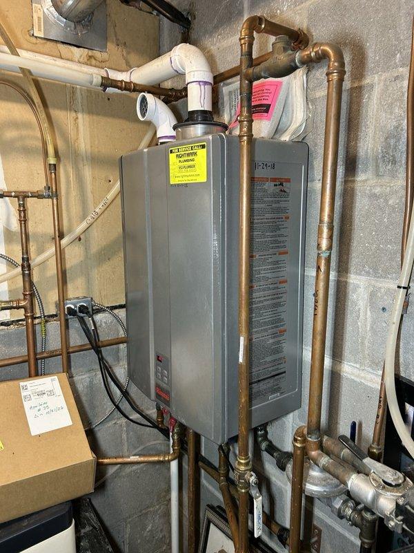 Completed annual heating maintenance visit on residential system including one furnace, two gas fireplaces, one garage heater, and humidifier. Performed comprehensive furnace tune-up with inspection and cleaning of flame sensor and ignition assembly. Inspected blower wheel, air filtration system, and inducer motor with amperage readings within specification. Measured flame sensor microamps and verified gas valve operation. Conducted combustion analysis showing system operating at 93.6% efficiency with safe carbon monoxide levels. Verified gas pressure and performed heat exchanger scope inspection. During internal heat exchanger examination, identified hairline crack that has not progressed past the crimp point. Issued safety advisory form documenting heat exchanger condition. All burners inspected and operating properly. System currently functioning within normal parameters. Documentation and photos provided for service records.