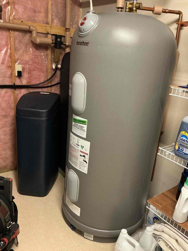 Completed comprehensive furnace maintenance on a 2-year-old Lennox heat pump system. Cleaned flame sensor, verified hot surface igniter ohms within specifications, and confirmed inducer motor amperage readings are operating properly. Performed operational testing of S40 thermostat on both first and second stage heating cycles, confirming proper system response and heat output with no issues reported.