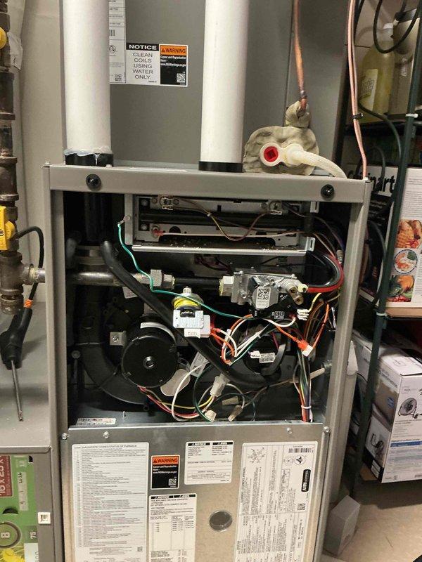Completed comprehensive furnace maintenance on a 2-year-old Lennox heat pump system. Cleaned flame sensor, verified hot surface igniter ohms within specifications, and confirmed inducer motor amperage readings are operating properly. Performed operational testing of S40 thermostat on both first and second stage heating cycles, confirming proper system response and heat output with no issues reported.