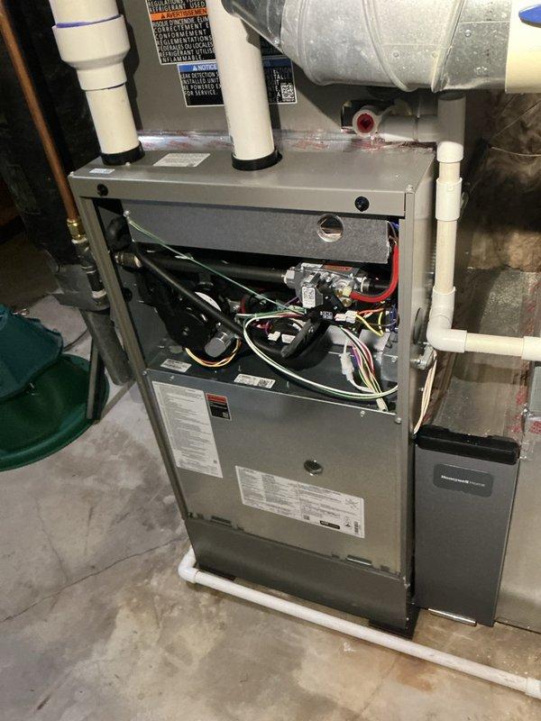 Completed fall preventative maintenance on three Lennox furnace units and two humidifier systems. Performed comprehensive service on all three furnaces including flushing condensate drain lines, cleaning flame sensors, and inspecting blower motors, inducer motors, and gas pressure—all components found operating within normal parameters. Replaced two air filters, including one 16x25x5 filter, and replaced one humidifier filter while inspecting the second which remained in serviceable condition. Verified electrical connections and control systems using multimeter diagnostics. Humidifiers confirmed non-operational due to existing indoor humidity level at 60%, which is above activation threshold. All systems tested and operating properly upon completion of maintenance protocol.