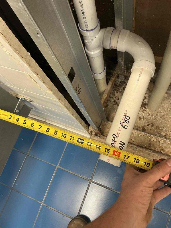 Completed rough-in plumbing work for commercial urinal replacement project. Installed new 2" PVC drain lines, trap arms, and waste piping through wall framing with proper venting and cleanout access points for future maintenance and descaling needs. Roughed in water supply lines to accommodate new flushometer valves, with all plumbing positioned and secured in accordance with code requirements and ready for fixture installation upon delivery of specified urinal units.