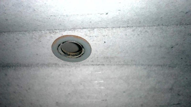 Completed comprehensive furnace tune-up and safety inspection per seasonal maintenance protocol. Performed thorough examination of heat exchanger, which revealed visible signs of corrosion and oxidation on the coil components with rust-colored staining on adjacent surfaces indicating moisture exposure over time. Documented all findings with photographic evidence showing corroded finned heat exchanger sections and discolored drain pan with rust accumulation around drain components. Recommended annual furnace maintenance to monitor heat exchanger integrity and prevent potential safety hazards from continued deterioration.