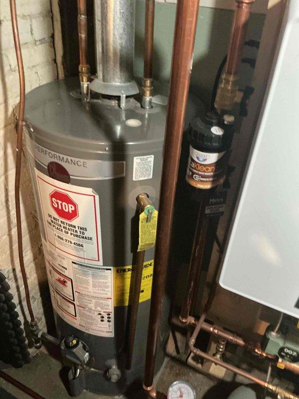 Performed comprehensive tune-up on 3-year-old Navien boiler system. Inspected control board, electrical connections, and all internal components for proper operation. Verified heating functionality, examined plumbing connections, pressure levels, and venting system. System found to be operational with no issues identified. Membership service completed.
