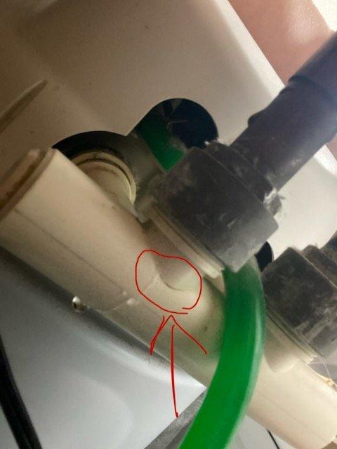 Responded to emergency water leak caused by cracked and failed bypass valve on residential water softener system. Upon arrival, water supply to home was already shut off by occupant to prevent further water damage. Performed diagnostic assessment of water treatment equipment and identified complete failure of bypass valve assembly with visible cracking and active leaking. Due to severity of damage and inability to repair existing valve, spliced water supply lines to bypass the failed component and restore water service to the residence. Documented equipment condition and repair work with photographs showing water heater, water softener system, and failed bypass valve components. Temporary repair completed successfully, restoring water supply to home while maintaining system integrity.