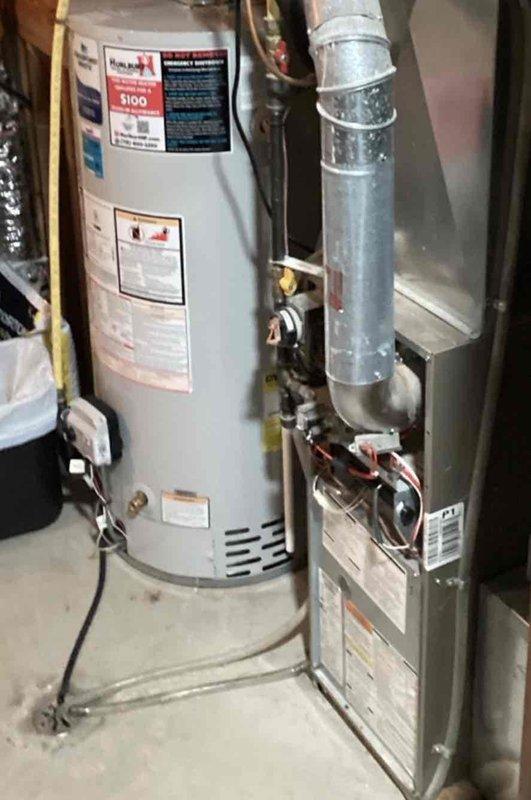 Completed comprehensive furnace maintenance on an 18-year-old unit, including cleaning of routine components, testing of all system parts, and verification of proper equipment operation. Confirmed humidifier was functioning correctly and all systems were operating within normal parameters.