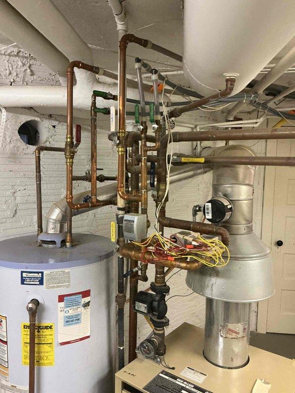 Completed annual fall heating maintenance visit on residential system including one furnace and one boiler per maintenance agreement. Performed comprehensive tune-up and safety inspection on gas furnace, verifying burner assembly operation, gas valve function, electrical connections, and control wiring integrity. Inspected boiler system including pressure vessel, circulator connections, and associated copper piping with isolation valves. All equipment tested and confirmed operational with no deficiencies noted.