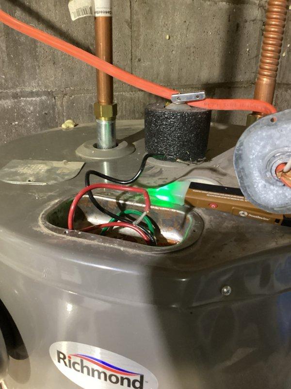 Responded to no hot water complaint on Richmond electric water heater. Upon inspection, discovered breaker supplying power to unit only had voltage present on one leg, indicating electrical supply issue upstream of water heater. Verified water heater components and wiring intact. Advised customer that an electrician is required to diagnose and repair the electrical panel or circuit breaker issue. Customer will arrange for their own electrician to complete necessary electrical repairs.