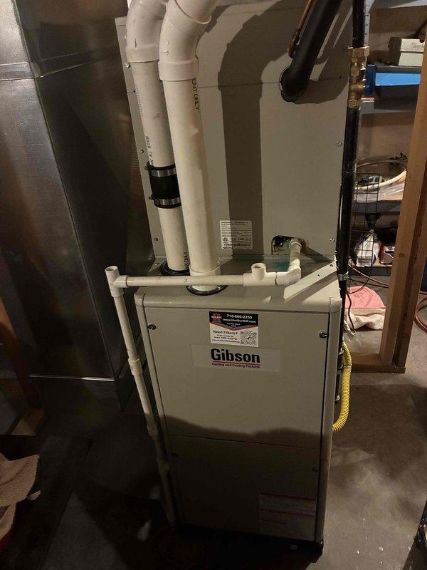 Completed scheduled preventive maintenance on Gibson furnace per manufacturer specifications. Performed comprehensive tune-up including inspection of heat exchanger, burner assembly, ignition system, and all safety controls. Verified proper operation of PVC intake and exhaust venting system, checked gas line connections for leaks, confirmed adequate combustion air supply, and tested blower motor operation. All components found functioning within normal parameters. Unit operating efficiently with no deficiencies noted.