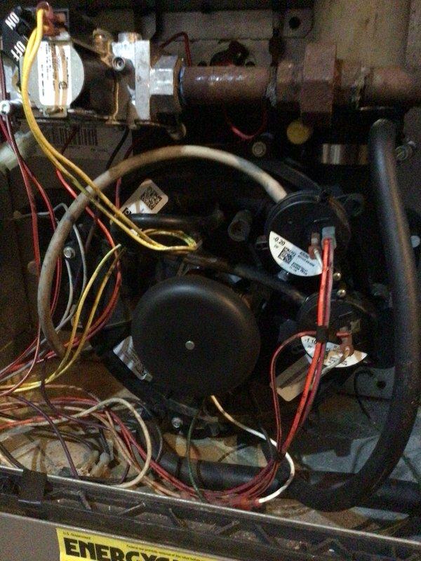 Completed comprehensive furnace tune-up on 15-year-old unit. System is currently operating within normal parameters; however, diagnostic testing revealed the inducer motor is drawing maximum rated amperage and intermittently exceeding specifications, accompanied by occasional squealing noise indicating bearing wear. Homeowner was informed of findings, and an estimate was provided for future inducer motor replacement to prevent potential system failure.