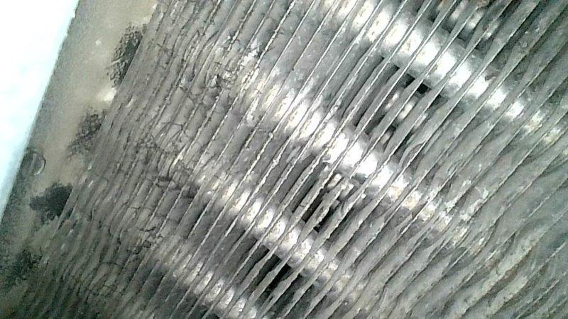 Performed comprehensive fall furnace tune-up on aging heating system. Cleared all condensate hoses and ports, cleaned flame sensor, and thoroughly inspected heat exchanger for cracks or deterioration. Replaced air filter and humidifier pad to ensure optimal air quality and humidity control. Verified all system components operating within normal parameters. Programmed thermostat with customer's preferred heating schedule for improved comfort and efficiency.