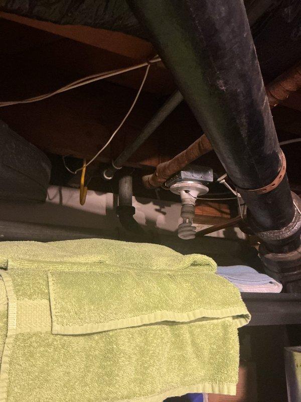 Responded to a water leak in the basement caused by deteriorated galvanized piping at a T-connection. Upon inspection, confirmed the galvanized pipe showed significant corrosion and active leaking at the joint where it connected to copper piping. Replaced the failing galvanized section with new piping to eliminate the leak and restore proper water flow. System was tested and verified to be operating without leaks upon completion.