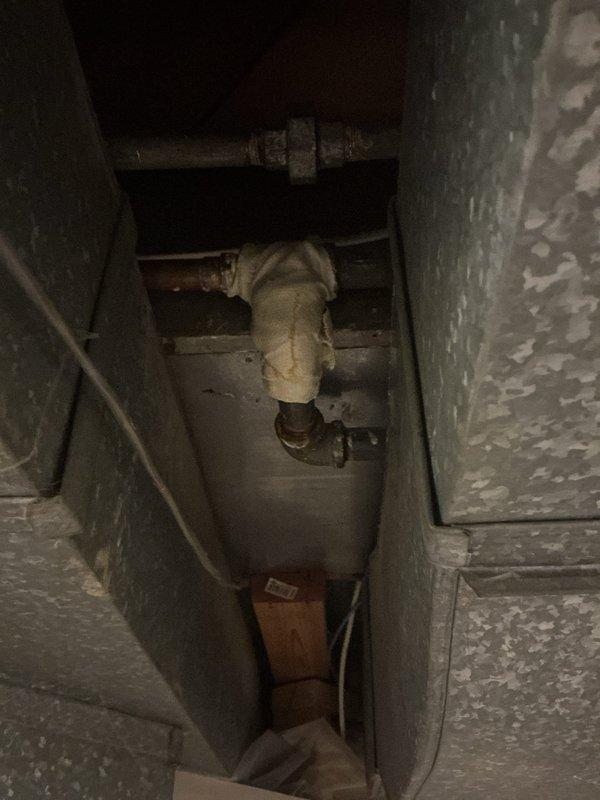 Responded to a water leak in the basement caused by deteriorated galvanized piping at a T-connection. Upon inspection, confirmed the galvanized pipe showed significant corrosion and active leaking at the joint where it connected to copper piping. Replaced the failing galvanized section with new piping to eliminate the leak and restore proper water flow. System was tested and verified to be operating without leaks upon completion.