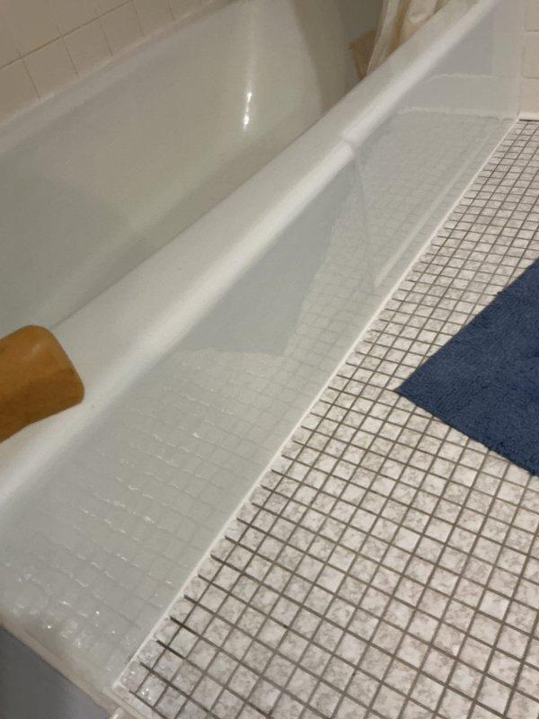 Responded to callback for leak originating from shower area following recent plumbing work. Upon investigation, identified tub spout as source of leak. Created wall access opening to expose copper supply lines and valve assemblies. Repaired leaking tub spout connection through dapping procedure. Tested system by filling bathtub to verify leak resolution and proper water containment.