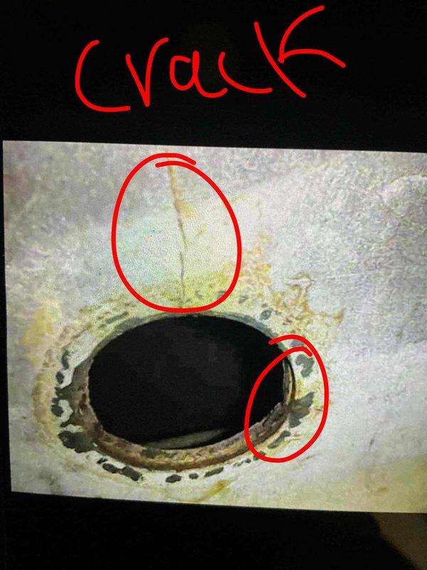 Responded to no heat call and performed diagnostic evaluation of furnace system. Upon inspection, identified failed heat exchanger with visible cracks in the primary heat exchanger assembly. Due to safety concerns regarding potential carbon monoxide exposure, immediately red-tagged the unit and shut down operation. Coordinated follow-up appointment for replacement estimate and documented damage with photographic evidence of heat exchanger cracks and structural deterioration.