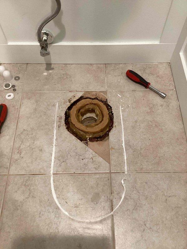 Responded to a callback for a persistently leaking toilet following initial installation and a previous reset attempt. Upon inspection, identified the toilet flange was improperly positioned below the finished floor level, preventing adequate wax ring seal compression. Removed toilet, cleaned existing wax ring residue from flange and toilet base, and installed a flange extender to bring the flange flush with the tile surface. Applied reinforced wax ring with integrated polyethylene funnel for enhanced seal integrity. Reset toilet with proper alignment, torqued closet bolts to manufacturer specifications, reconnected water supply line, and tested for leaks. Verified proper bowl stability and confirmed complete seal with no water discharge at base during multiple flush cycles.