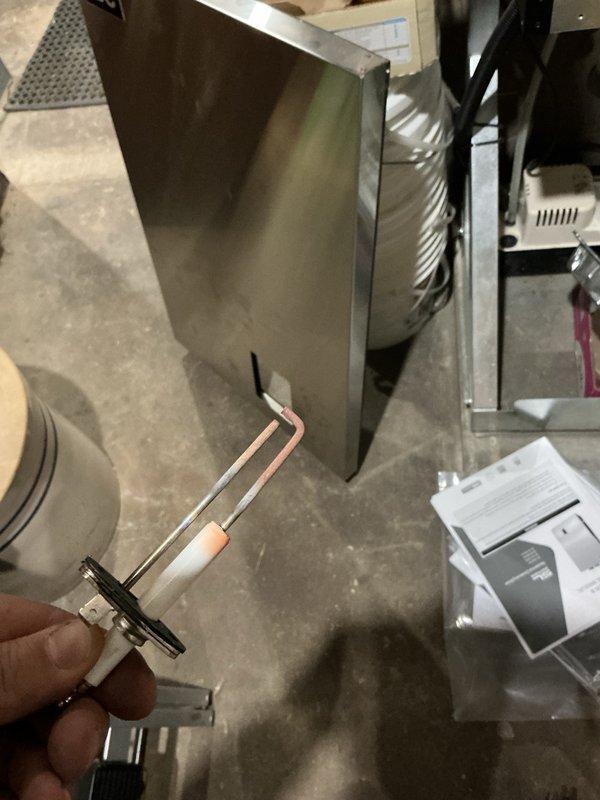 Responded to complaint of popping noise during boiler ignition. Removed and cleaned igniter, inspected heat exchanger through ignition port, and verified all visible components. Ignition pop persisted after cleaning. Will require follow-up visit with combustion analyzer and manometer to diagnose gas-air mixture and pressure issues causing delayed ignition.