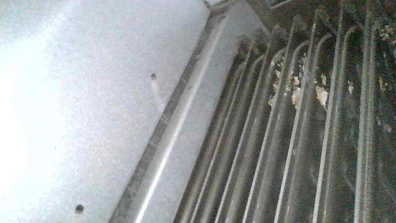 Responded to no-heat call on a 2011 Bryant high-efficiency gas furnace displaying error code 13, which initially started as code 33 before transitioning after three minutes of operation. Upon inspection, identified a failed secondary heat exchanger and tripped rollout limit switch, indicating unsafe operating conditions with potential flue gas spillage. Tagged out the furnace with lockout/tagout procedures to prevent operation due to safety hazard, documented the failed heat exchanger component with photographic evidence, and coordinated with scheduling to arrange follow-up consultation regarding replacement options.