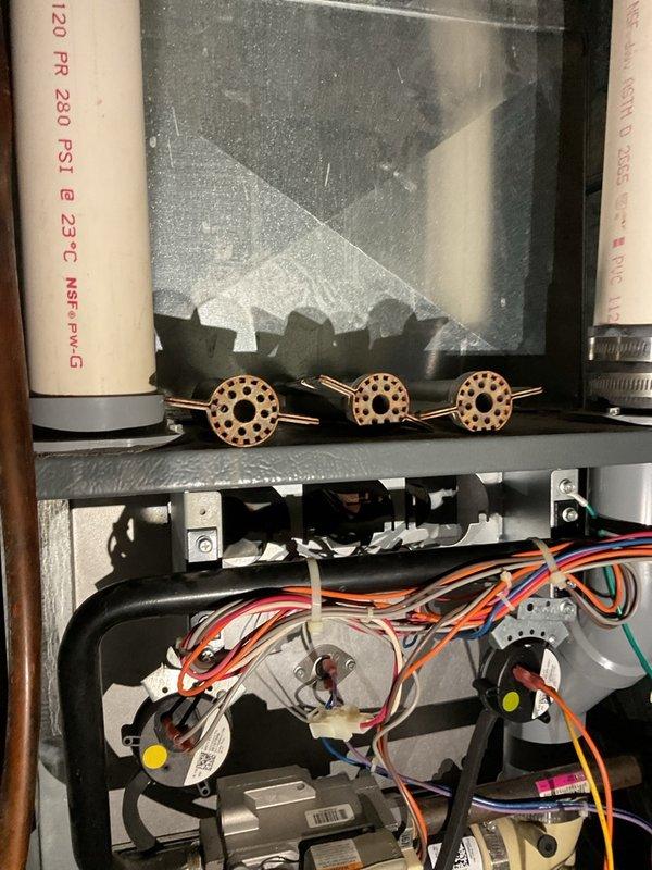 Completed scheduled heating system maintenance as part of Family Rewards maintenance campaign. Upon inspection, furnace showed significant deterioration with worsened heat exchanger condition compared to previous October service visit. Observed substantial frost/ice accumulation on internal components indicating potential condensation issues and compromised system integrity. Heat exchanger exhibited advanced deterioration with visible surface damage and wear patterns consistent with end-of-life failure. Consulted with management regarding equipment condition and documented findings with comparative photos. Due to extensive deterioration, inexpensive replacement value, and safety concerns related to heat exchanger integrity, unit was red-tagged and taken out of service. Recommended immediate furnace replacement due to age, condition, and potential safety hazards.