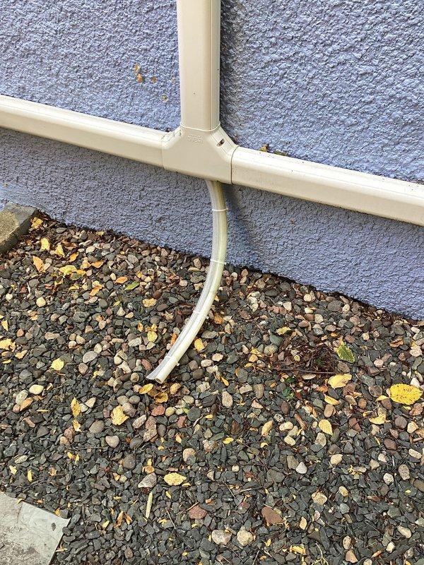 Replaced condensate drain lines on two Mitsubishi mini-split indoor head units using 5/8-inch braided tubing, which is the proper specification for these systems. The original vinyl tubing was removed and replaced with approximately 25 feet of new drain line material across both units. All drain lines were tested and confirmed to be functioning properly with no leaks or blockages upon completion.