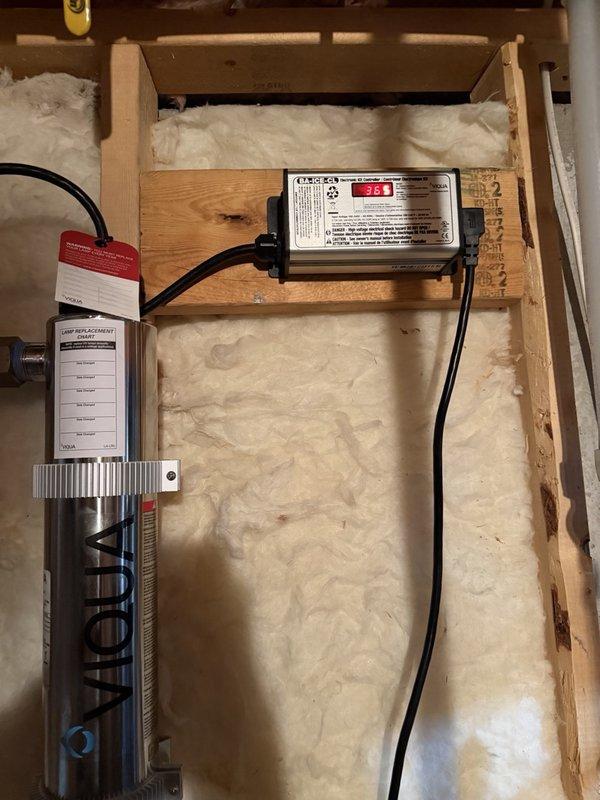 Responded to service call for water treatment system displaying Error Code A3 with audible alarm. Diagnosed failed UV sterilization light in whole-house ultraviolet water purification system. Replaced UV lamp and verified proper operation of ballast and control unit. Additionally performed maintenance on under-sink reverse osmosis filtration system, replacing all RO membrane filters and cartridges. Tested both systems for proper flow rates and confirmed error code cleared with all indicators showing normal operation.