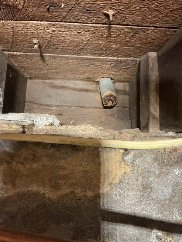 Responded to emergency plumbing call for multiple water leaks in kitchen and bathroom. Upon inspection, found kitchen sink drain pipe broken off approximately 2 feet inside wall cavity, refrigerator water supply line leaking at connection point, and toilet leaking at base due to failed wax ring seal. Secured refrigerator supply line by tightening compression fitting to stop active leak. Removed and replaced toilet wax ring seal to eliminate base leakage. Accessed wall cavity and repiped kitchen sink drain line using PVC pipe and fittings, replacing damaged section and establishing proper drainage connections. All repairs tested and verified leak-free upon completion.