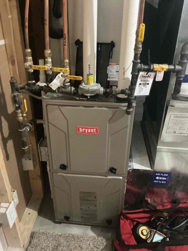 Completed furnace maintenance and tune-up in conjunction with tankless water heater installation. During inspection, discovered the gas valve adjustment cover had corroded onto the valve assembly, preventing proper access and adjustment. Replaced the defective gas valve to ensure safe and efficient operation of the heating system.