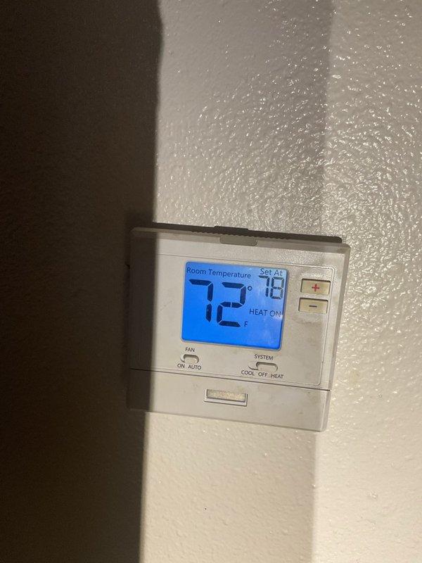 Responded to no-heat call on York UPG G9T06012DHB13C furnace displaying 4-flash open-limit fault code. Performed comprehensive diagnostic and found temperature rise at 70°F, exceeding the manufacturer's rated specification of 35–65°F. Tested blower operation by changing speed tap from blue to red/black wire; confirmed 7.5 µF run capacitor within tolerance at 7.42 µF. 

Inspection revealed multiple critical issues: small crack in inducer collector box with loud electronic buzzing during operation despite acceptable amperage draw, active gas leak at furnace gas-valve union, and deteriorated burner assembly contributing to overheating condition. During inspection, also identified separate gas leak at power-vent water-heater gas-valve body during hot-water call.

No parts replaced during this diagnostic visit. Documented all findings with photos and discussed system condition with property manager, advising that continued operation will result in persistent overheating and potential safety
