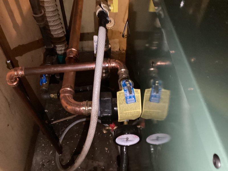 Responded to callback for loud rattling noise from recently installed boiler system. Upon inspection, identified noise source as pipe-to-pipe contact occurring during boiler operation. Installed insulation material between contact points where piping was tapping together to eliminate noise and prevent future wear. System tested and confirmed quiet operation after insulation placement.