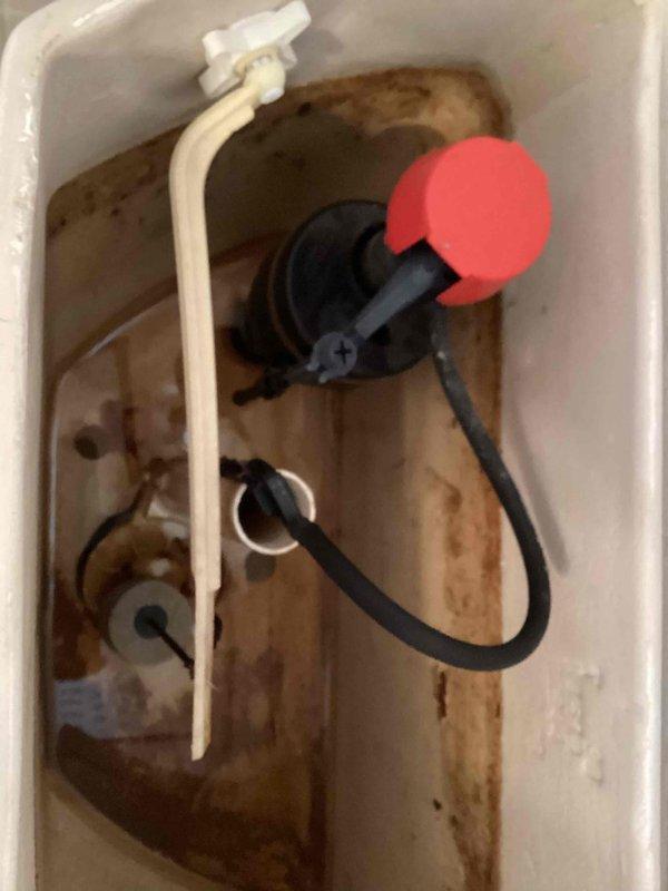 Responded to a continuously running toilet at a residential property. Upon inspection, found the existing fill valve and flapper were worn and causing the constant water flow. Replaced the faulty fill valve with a new Fluidmaster PRO45 professional-grade fill valve, installed a new Kohler GP85160 flapper assembly, and replaced the deteriorated supply line to ensure proper operation and prevent future leaks.