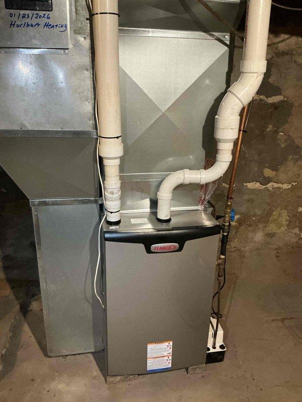 Completed comprehensive maintenance tune-up on Lennox furnace system under rewards plan agreement. Performed thorough cleaning of routine components including burner assembly, verified proper gas combustion with uniform blue flame pattern across all burners, and inspected gas valve assembly and connections. Tested all equipment operations, confirmed proper function of heat exchanger, verified condensate drain lines and PVC venting system integrity, and inspected refrigerant lines and electrical connections to ensure system is operating safely and efficiently for the heating season.