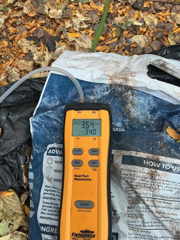 Performed annual fall heating tune-up on one ground-mounted Bryant packaged rooftop unit (RTU), including inspection of the cabinet, condensate drain, electrical disconnect, and condenser fan area, and verified operation with a dual-port manometer to check pressure readings. No issues were found, and the unit was left operating normally.