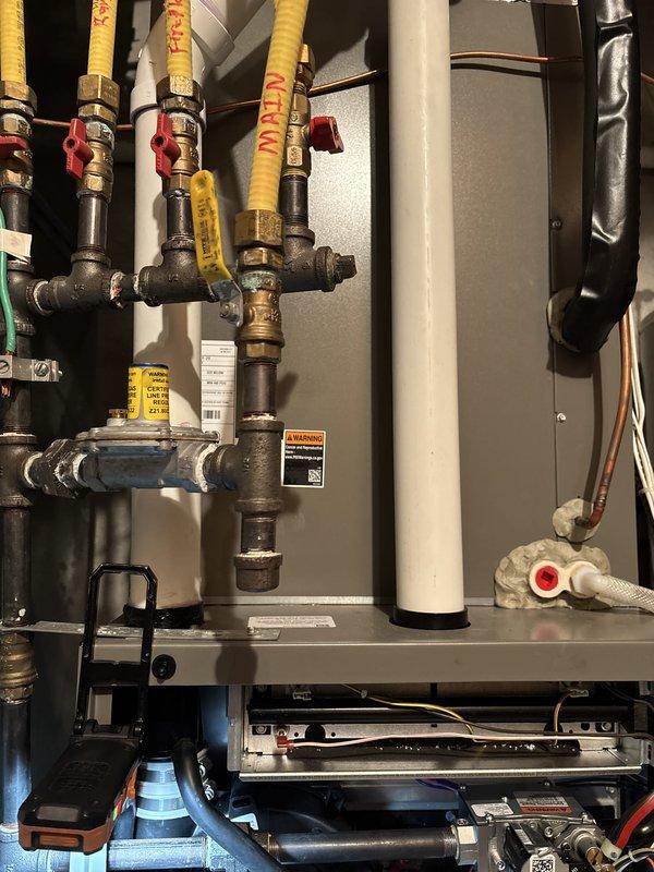 Performed seasonal maintenance on a two-year-old furnace, inspecting the thermostat call for heat, filter, condensate drain, blower and inducer motors, capacitor, wiring, heat exchanger, igniter, and flame sensor, all within normal operating parameters. Found gas pressure slightly high on both low and high stage and adjusted to specification. Temperature rise was climbing toward overheat with supply air at 139°F, so the restrictive MERV 16 filter was replaced with a 1" MERV 8 and blower speed was increased to high, bringing supply temperature to 134°F with a 58°F temperature split, within the acceptable range.