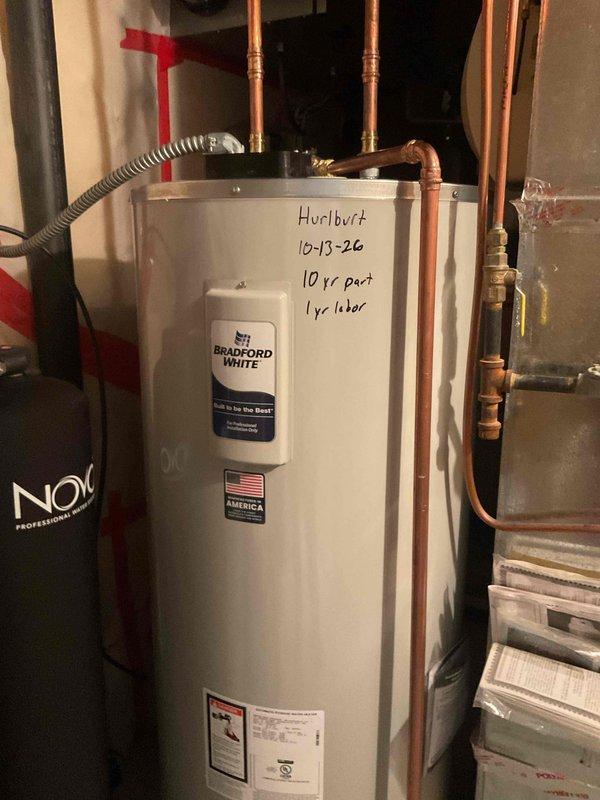 Installed a new 80-gallon Bradford White electric tank water heater in the mechanical closet, completing the plumbing connections and wiring the unit to the electrical supply through armored flexible conduit. The installation passed the required inspection, with no leaks, corrosion, or damage observed at the unit or the adjacent breaker panel. The unit is covered by a 10-year parts and 1-year labor warranty.