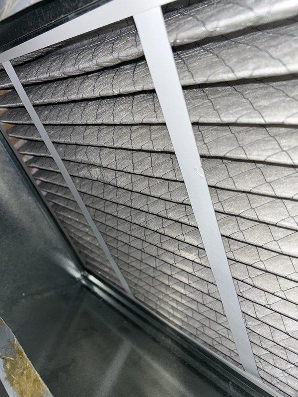 Responded to a no-heat complaint on a furnace over 10 years old and found the W1 heat-call wire loose at the control board terminal, preventing the heat demand signal and causing the unit to blow cold air. Re-stripped and re-secured all low-voltage control wires at the board terminals, and verified proper terminal connections. Likely cause was continuous vibration from the thermostat being left in "fan on" mode, which loosened the connections over time.