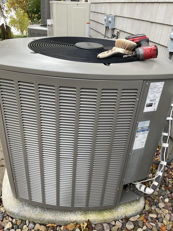 Performed a scheduled tune-up on a 7-year-old gas furnace under the maintenance agreement, completing all checklist inspections and verifying proper operation with no deficiencies found. Also cleaned the outdoor heat pump condenser coils with a stiff-bristle brush to remove dust and debris buildup, and confirmed the system was operating as designed.