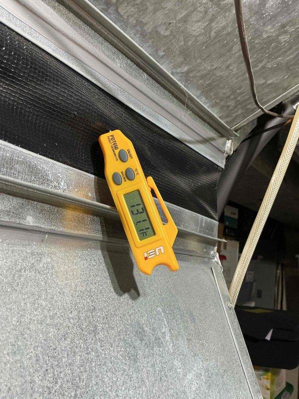 Performed annual heating tune-up on one gas furnace, inspecting the burner compartment and gas valve assembly and verifying combustion and operating performance with a handheld meter. Measured supply-side temperature at the ductwork (131.1°F) to confirm proper heat output. No issues were found, and the unit is operating normally.