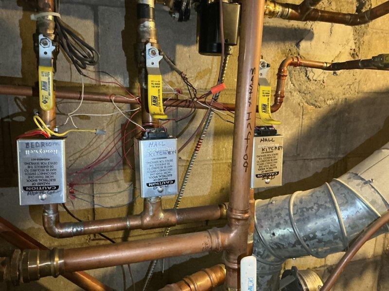 Performed annual fall tune-ups on two gas-fired boilers (13 and 12 years old), verifying gas pressure, flue CO levels, burner and ignition system condition, expansion tank function, and water pressure and operating temperature. All circulator pumps and zone valves operated properly, no CO was detected at the 13-year-old unit's jacket, and both boilers were found safe and fully operational.