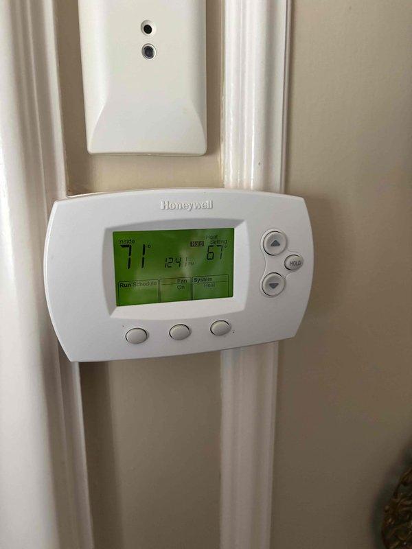 Performed a system walkthrough at the homeowner's request to document the locations, model numbers, and serial numbers of the boiler, air conditioning system, and air exchanger (AE) for future maintenance and service reference; no maintenance was performed. Recorded reported service history, including intermittent boiler error code 18 requiring manual resets and certain radiators overheating. No active faults were present at the time of the visit.