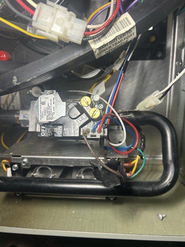 Returned to replace the gas valve wiring harness on the lower-level furnace as part of a sold repair. Removed the front access panel and inspected the gas valve terminal block and associated wiring, and determined the supplied replacement harness was incorrect for this unit, so the replacement could not be completed. The correct harness will be re-ordered and the part forms completed to schedule a return visit; the furnace was left with its original wiring in place.