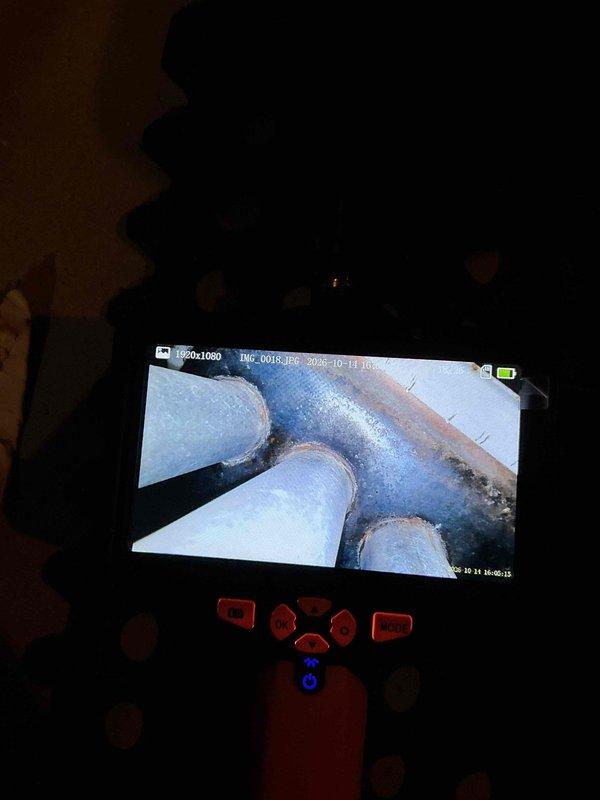 Performed a tune-up and safety inspection on two 30+ year old gas furnaces, verifying ignition, flame safety, gas valve operation, combustion analysis, and temperature rise on both units, all within specification. Borescope inspection of the main floor unit revealed heavily rusted burners and significant heat exchanger corrosion with no visible openings, while the upper floor unit's burners and heat exchanger were in better condition. Reviewed system options with the homeowner and scheduled a service advisor for follow-up.