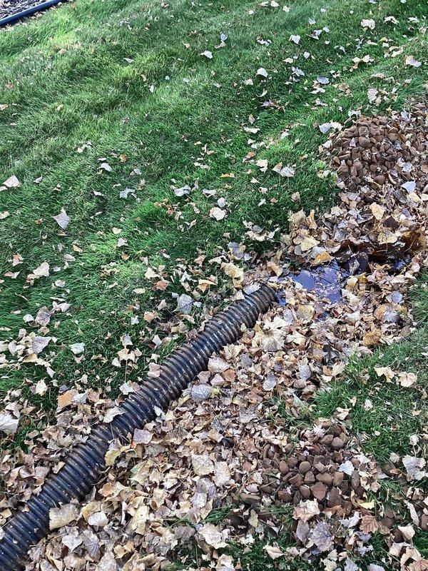 Responded to a callback for a sump pump alarm that continued sounding after prior visits. Found the primary float stuck in position and the secondary float set too low, causing false alarm triggers. Cleared the primary float and repositioned the secondary float to eliminate the nuisance alarm. Verified the discharge line terminates properly on the exterior grade and drains freely away from the structure.