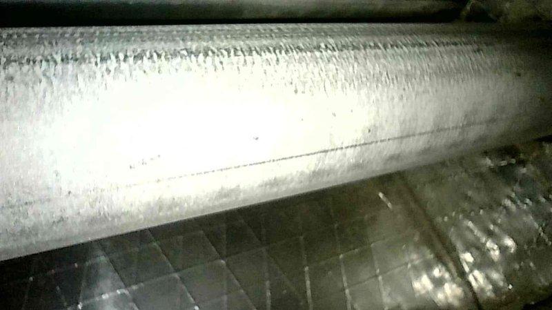 Performed a seasonal tune-up on the Magic-Pak packaged HVAC system, inspecting the components and noting frost/ice accumulation on the evaporator coil and surrounding surfaces, which indicates a possible airflow restriction or refrigerant-related issue requiring further evaluation. The Honeywell steam humidifier canister requires replacement, and a return visit has been scheduled to install the part.