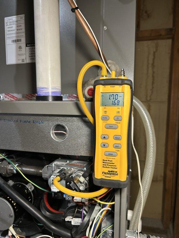 Performed a full tune-up on a three-year-old Lennox gas furnace, verifying normal heating sequence operation with no faults found. Cleaned the flame sensor, adjusted gas manifold pressure to the proper reading using a digital manometer, and inspected the igniter, burners, blower motor wheel, air filtration, and carbon monoxide levels. System is operating properly; recommended staying current on routine maintenance and air filter replacement.